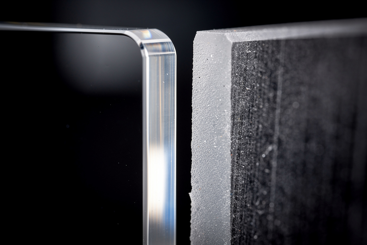Comparison of flame-polished laser-cut acrylic edge versus frosted CNC-cut acrylic edge
