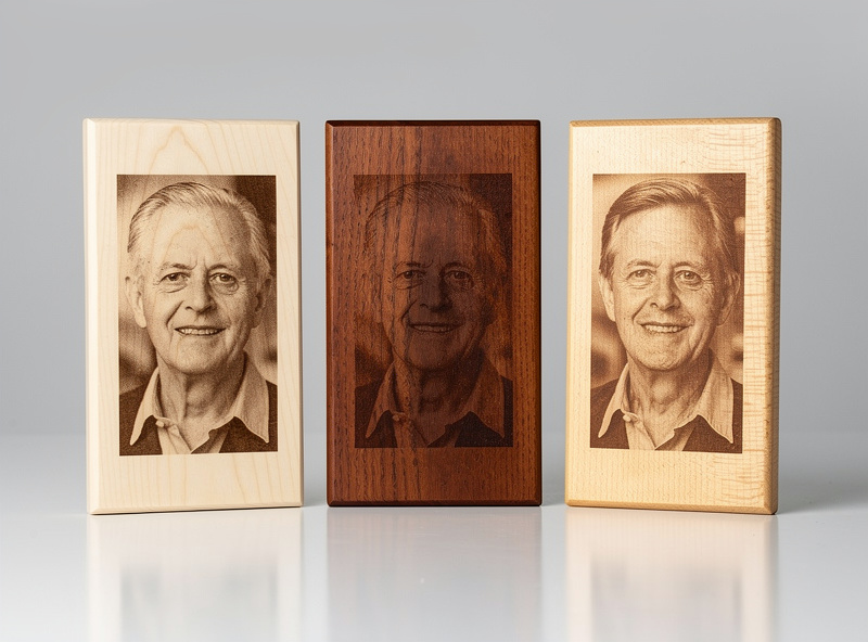 Comparison of three engraved photo plaques on different woods at different DPI settings